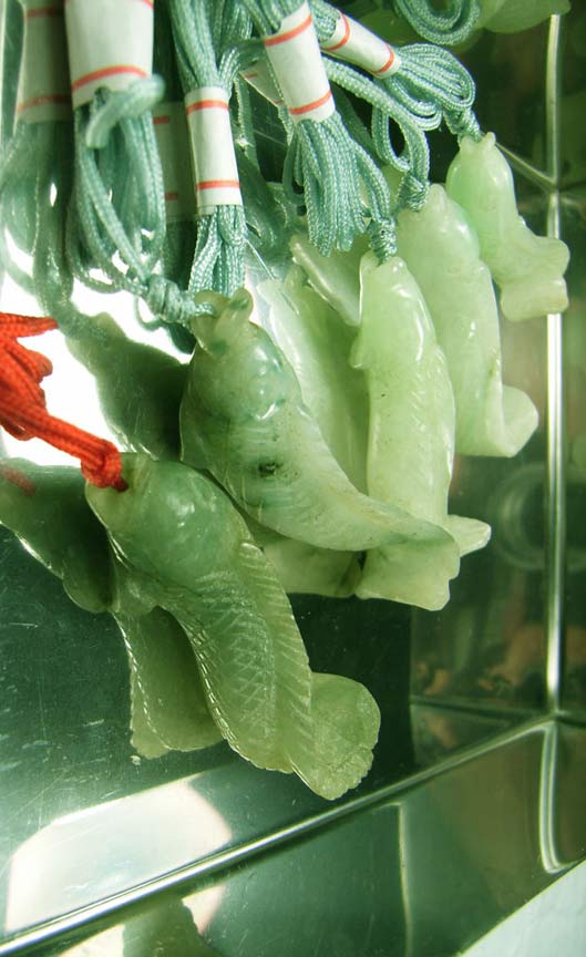 (SOLD) Jadeite untreated, elegantly carved, superior polish