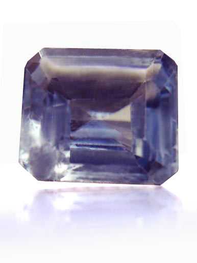 Untreated electric light blue, good luster, emerald cut, .72ct.