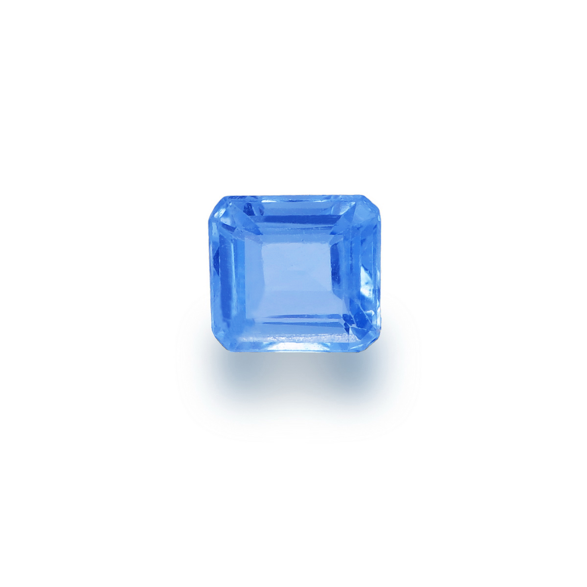 Untreated electric light blue, good luster, emerald cut, .72ct.