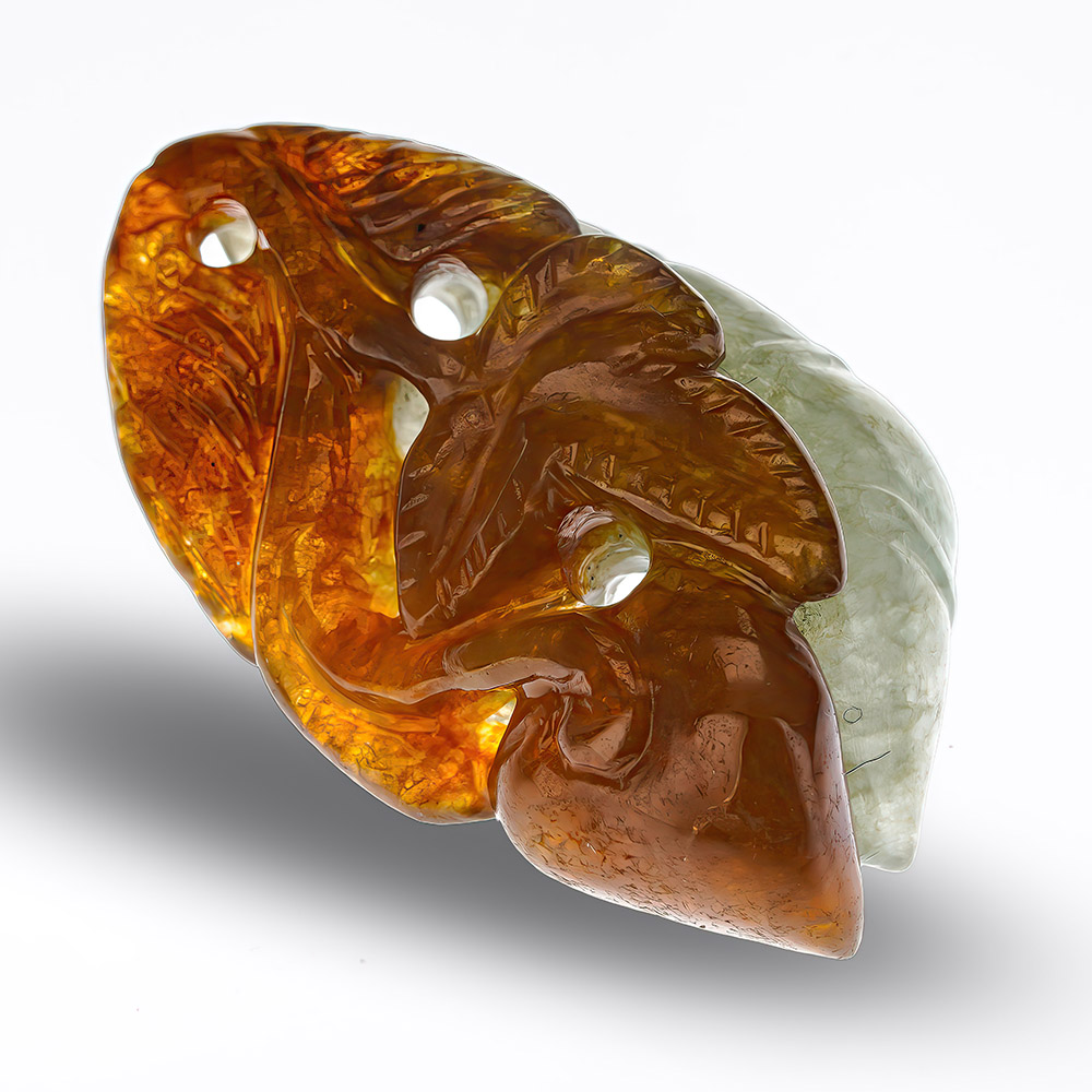 Jadeite flower pendants, each side a different carving & color